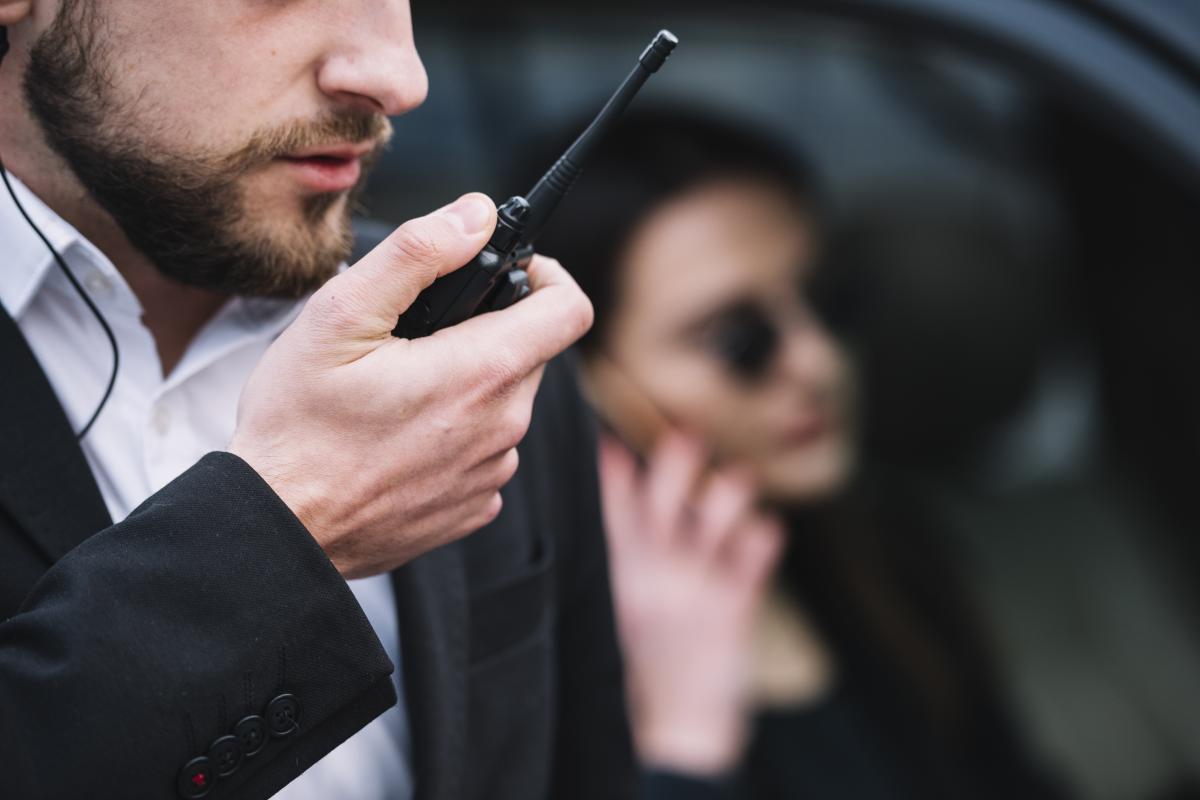 close up security man using equipment Houston Executive Protection / Executive Security